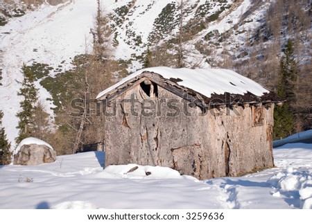 wooden lodge covered thick layer of snow