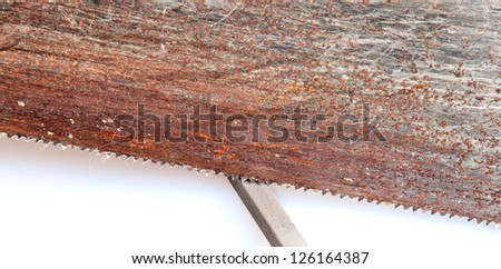 Rusty saw being sharpened concept