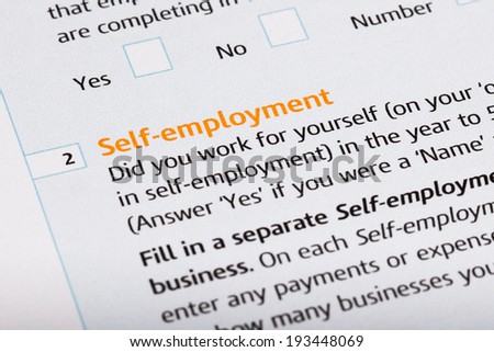 Self employed word on a tax form