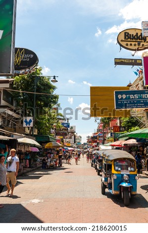 Tourists walk along backpacker haven Kao San Road as officials warn visas on arrival may be rolled back in the wake of recent terrorism incidents on Aug 24, 2014 in Bangkok, Thailand.