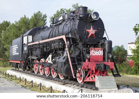 KARASUK, RUSSIA - JUNE 29: Monument Old locomotive, coal-fired on June 29, 2014 in Karasuk.