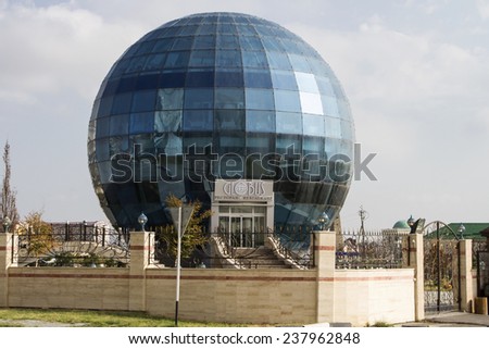 GROZNY, RUSSIA - SEPTEMBER 7: Modern restaurant with a glass facade - Globus on September 07, 2014 in Grozny.