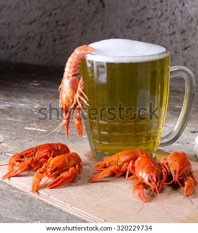 Mug of beer and boiled crawfish