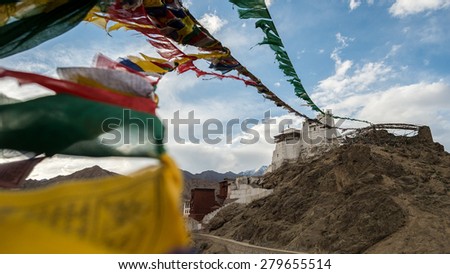 Namgyal Tsemo Gompa, The Buddhist monastery in Leh Ladakh  with prayer flag dramatic cloudy blue sky.