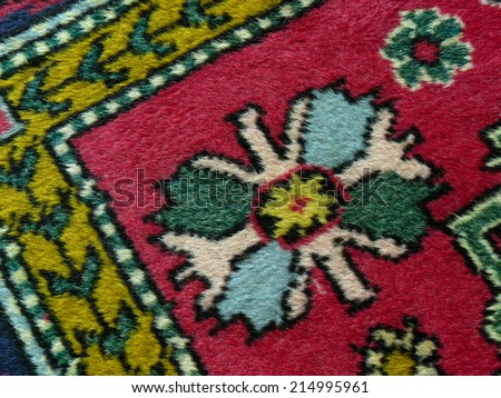 old colorful carpet fragment