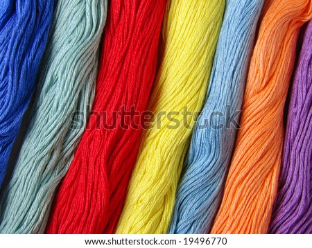 colorful threads set for needlework as a background