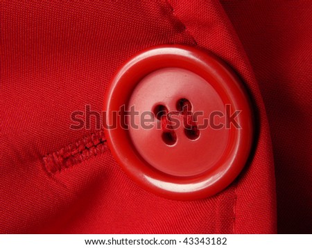 red clothes fragment with button
