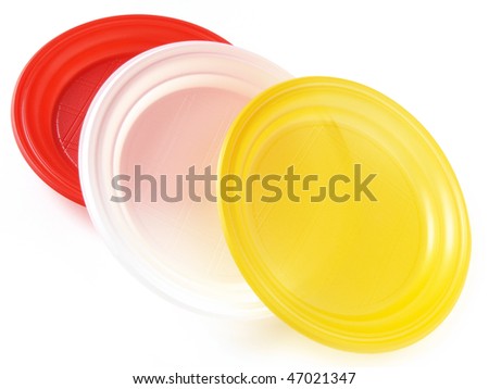 three colorful disposable plates on white