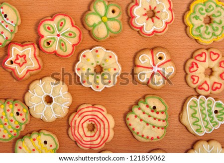 Christmas Ginger and Honey cookies on isolated wooden background