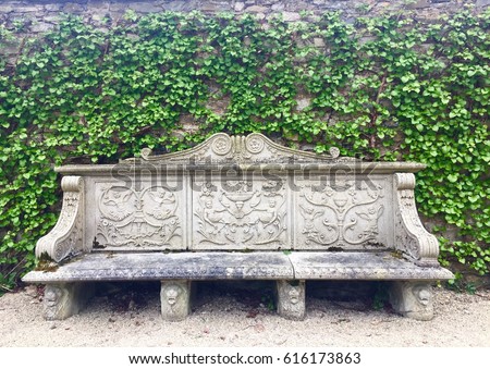 Ornate stone bench with ivy wall ストックフォト © 