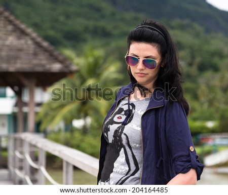 Beautiful girl on exotic vacation in remote island