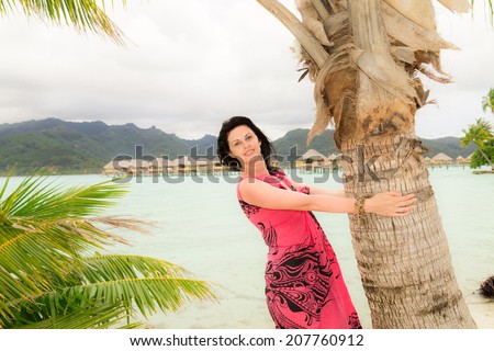 Beautiful girl on exotic vacation in remote island