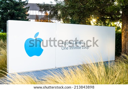 CUPERTINO, CA/USA - JULY 13: Apple headquarters on July 13, 2014 at Infinite loop in Cupertino. Apple Inc. is company that designs and develops electronics,  software, online services and computers.
