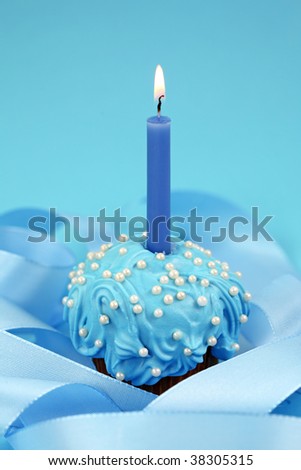 Birthday cake on blue background