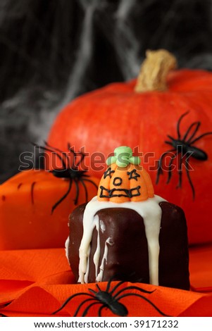 Halloween cakes on orange serviette