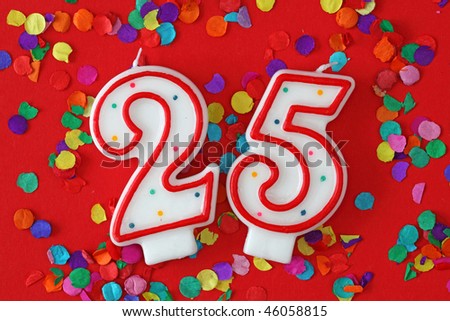 Number twenty five birthday candle on red background
