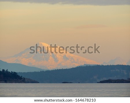 Mount Baker in State Washington seen across the body of water