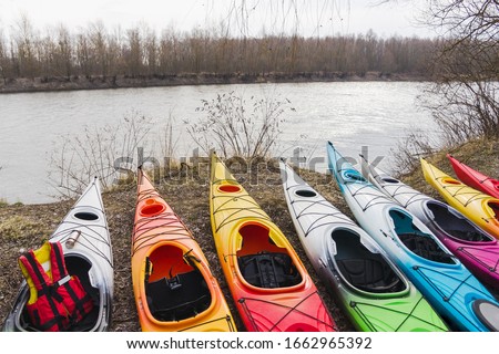 Similar – Image, Stock Photo Many canoes ready to go out