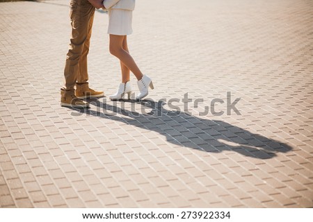 couple in love. boyfriend and girlfriend dating outside. shadows of kissing woman and man. unrecognizable people