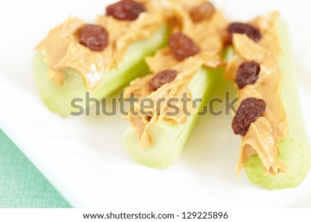 Ants on a log. Celery sticks with peanut butter and raisins.
