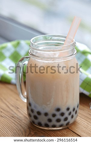 Bubble boba tea with milk and tapioca pearls