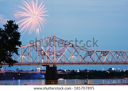 Fireworks by Ohio River by Kentucky/Indiana border bridge on Ohio River