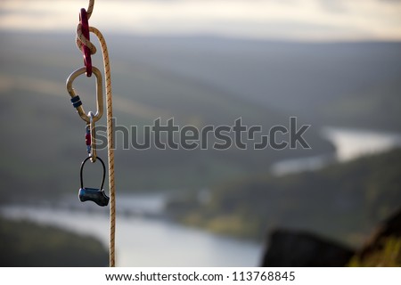 rock climbing rope with hooks overlooking a nice view