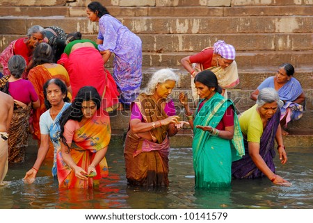 Colorful Hindu Women Bathing In The Ganges In Varanasi Stock Photo ...