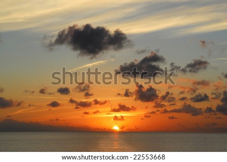 Sunset or sunrise over the ocean at Maria la Gorda beach, Cuba