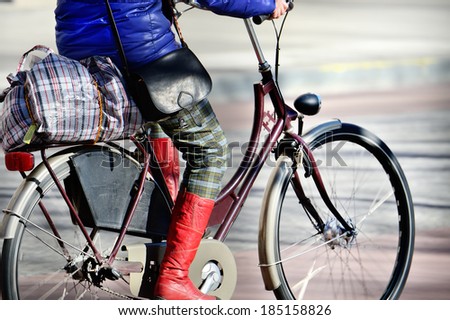 Panning blurred scene of bicycle in profile