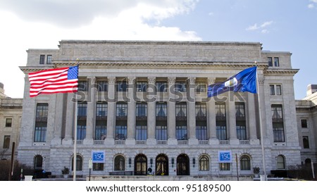 Department of Agriculture office building, American flag flapping, in Washington DC, United States