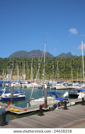 Landing stage with yachts standing on an anchor, Langkawi, Malaysia