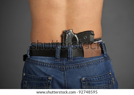 Man`S Back With Gun Tucked In Pants. Isolated On White Background ...