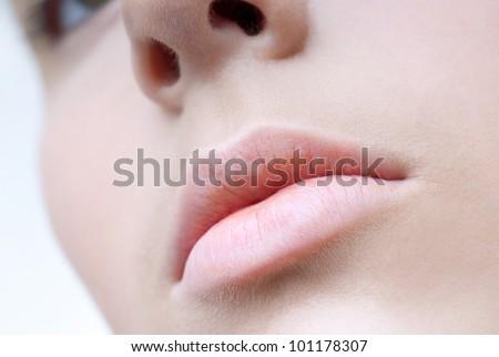 Very beautiful lips on the clean face