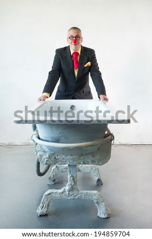 Man in suit with art bath