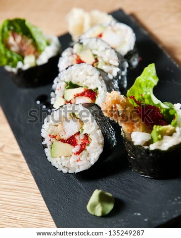 sushi. roll on a stone plate. asian cuisine