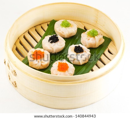 Dimsum Hagao in chinese bamboo basket. dumplings. isolated on white