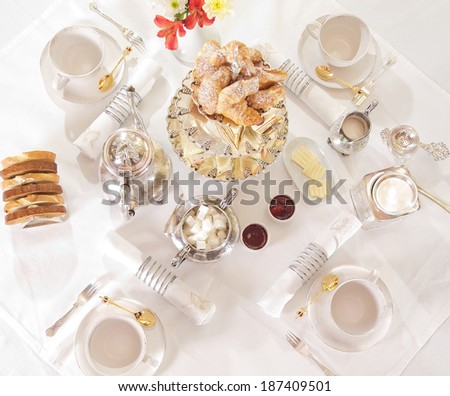 preparing tea. breakfast table