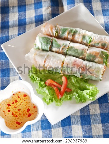 Spring rolls with vegetables, seafood and sauce