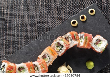sushi on the black stone plate