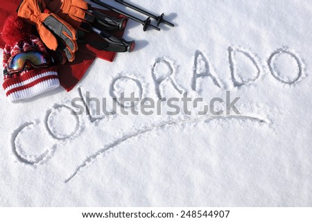 Colorado : snow writing, ski equipment.