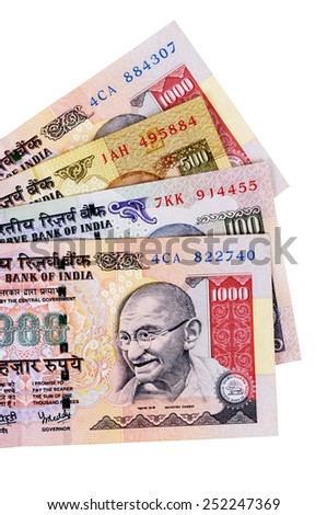Indian Rupee : Fan shape set of Indian Rupee currency bills isolated on white background.  Indian Rupees isolated.