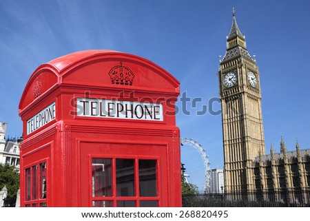 Red telephone booth, Big Ben clock tower, London UK