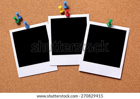 Polaroid frame photo print row, pushpin, cork background.  Copy space