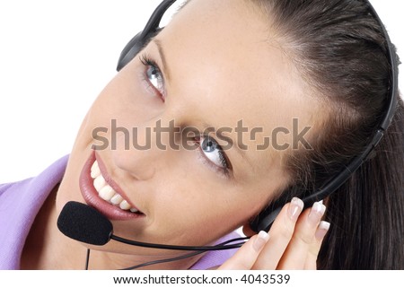 Attractive telephone worker listening attentively to a customer