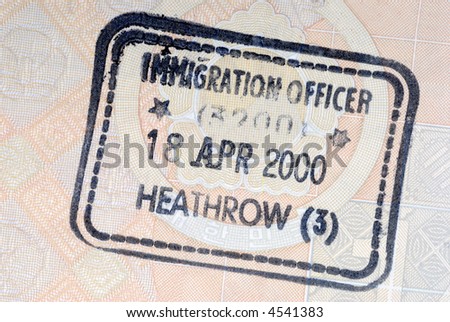 United Kingdom immigration entry stamp on the inside page of a passport.