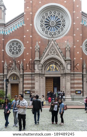 ISTANBUL, TURKEY - APRIL 23, 2014: People visiting church of St. Anthony of Padua basilica Roman Catholic Church on Istiklal Avenue on April 23th, 2014 Istanbul, Turkey.