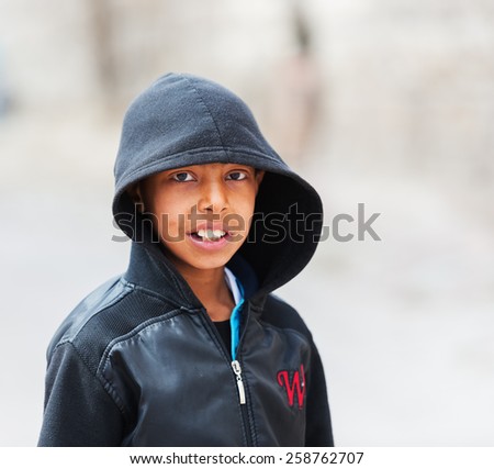ISTANBUL, TURKEY - MARCH 04, 2015: Happy Turkish child looking at camera.They live in the Cappadocia
