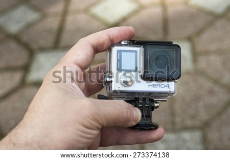ISTANBUL, TURKEY - APRIL 28 ,2015: Gopro action camera in hand.Shot of GoPro Hero 4 Black.It is a compact, lightweight personal camera manufactured by GoPro Inc.