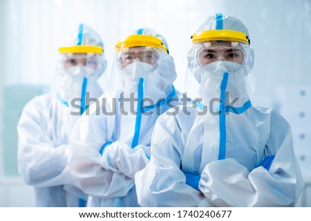 Similar – Image, Stock Photo doctor man wearing protective mask and gloves indoors. Holding an alcohol gel or antibacterial disinfectant. Hygiene and corona virus concept. Covid-19